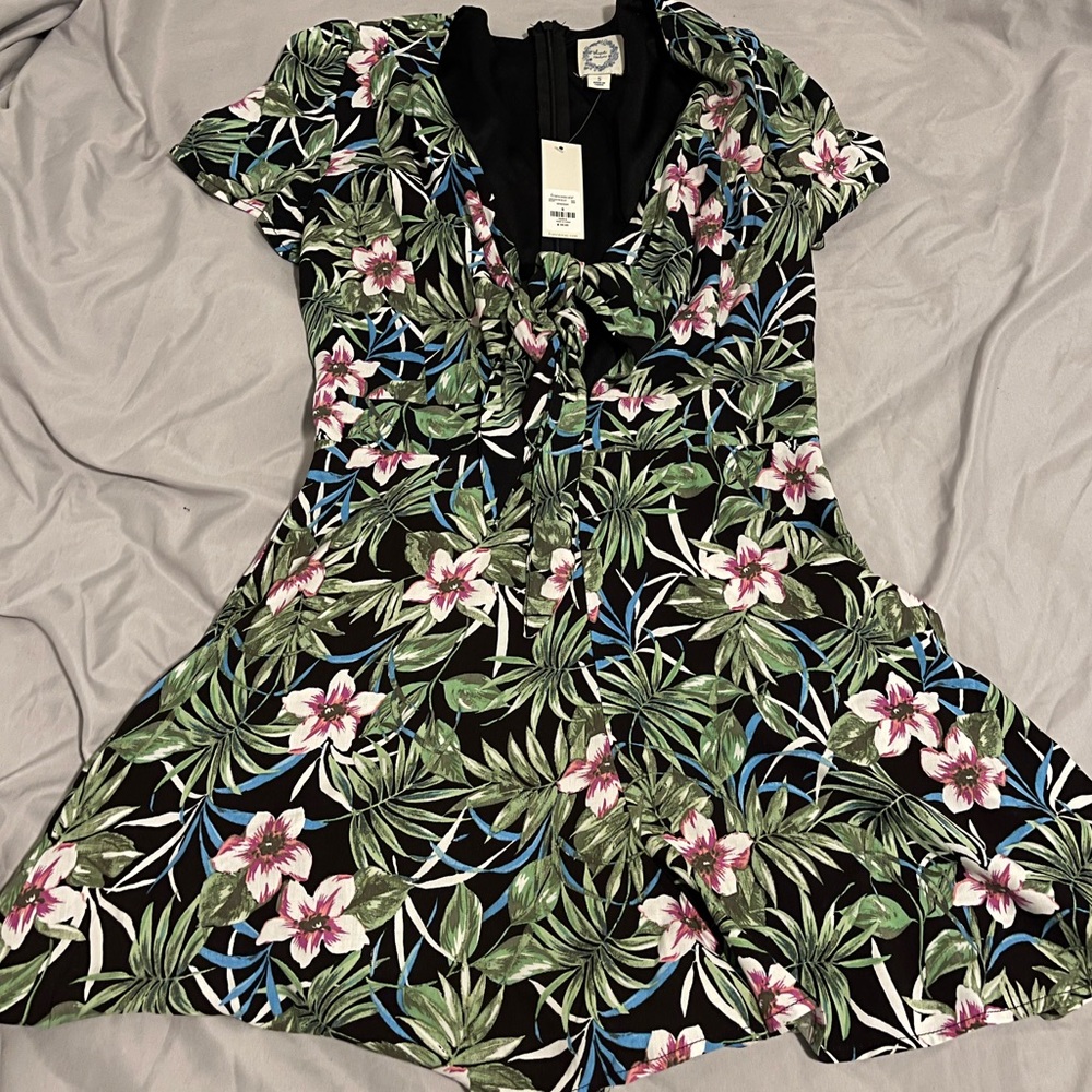 Black floral romper from blue rain (Francesca’s)